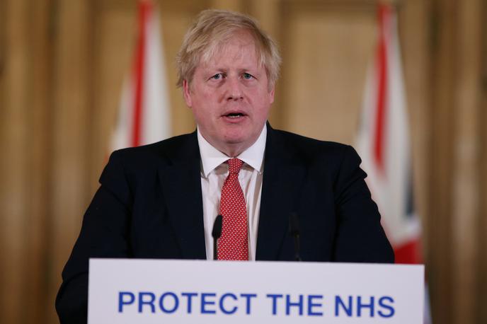 Boris Johnson | "S tem večerom dajem Britancem preprosto navodilo − ostati morate doma," je Johnson dejal pred letom dni, ko je naznanil najostrejše omejitve javnega življenja v državi po koncu druge svetovne vojne. | Foto Reuters