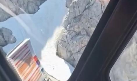 Policija delila video reševanja gornika, ki je ostal ujet v gorah #video