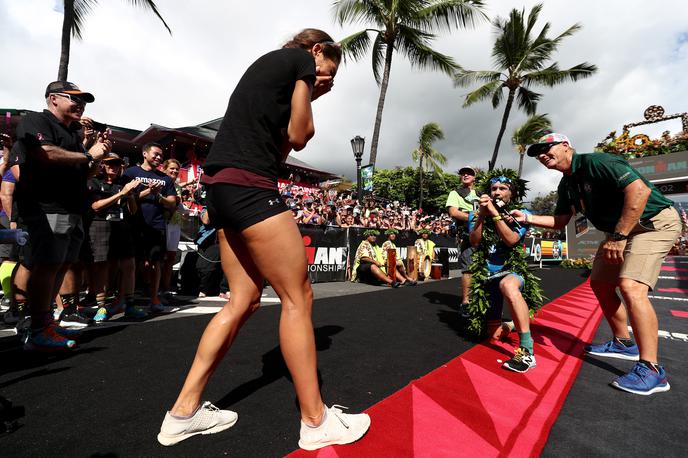 Patrick Lange Havaji ironman 2018 | Nemški triatlonec Patric Lange je slavje v cilju svetovnega prvenstva v ironmanu na Havajih izkoristil za novo slavje: svoje dekle je zaprosil za roko in dobil pritrdilni odgovor. | Foto Getty Images