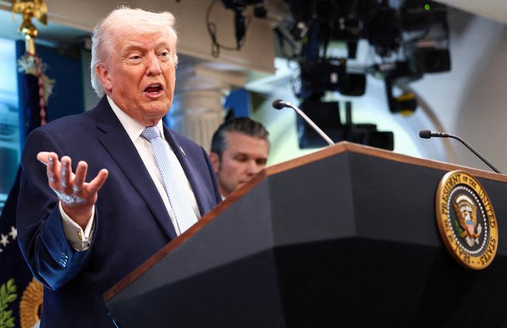 "Hezbolah ni bil vključen v dogovor. Tudi to se bo uredilo. Nič hudega. To je ločen spopad," je dejal Donald Trump.  | Foto: Reuters