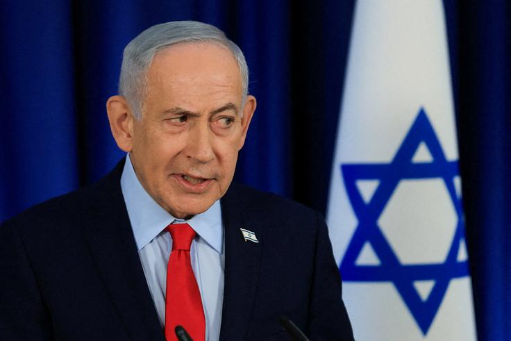 Benjamin Netanjahu in minister za obrambo Izrael Kac sta vojski naročila, naj napade teroristične cilje v bejrutski četrti Dahiyeh. | Foto: Reuters