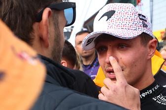 Lando Norris ob proslavljanju dobil udarec po nosu #video