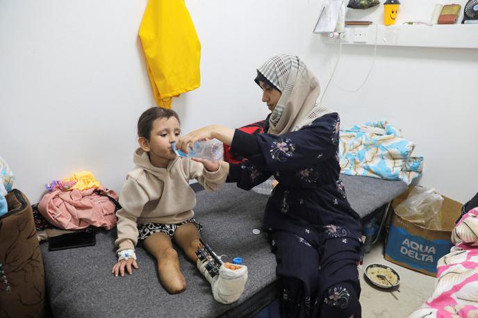 Eman Al-Kholi, Rafa | Lobanje majhnih otrok še niso popolnoma oblikovane, njihove nerazvite mišice pa nudijo manj zaščite, zato obstaja večja verjetnost, da bo eksplozija raztrgala organe v njihovih trebuhih, četudi ni navzven vidnih poškodb," pojasnjuje Jason Lee, direktor organizacije Save the Children za okupirano palestinsko ozemlje. | Foto Reuters