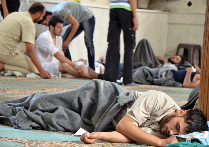 Avgust 2013: Uporniki poročajo, da so Al Asadove sile v napadu uporabile kemično orožje. | Foto: Reuters