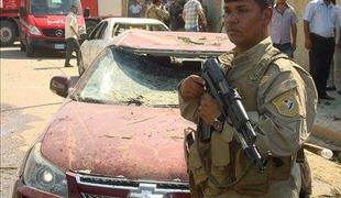 Niz eksplozij v Bagdadu terjal več deset življenj