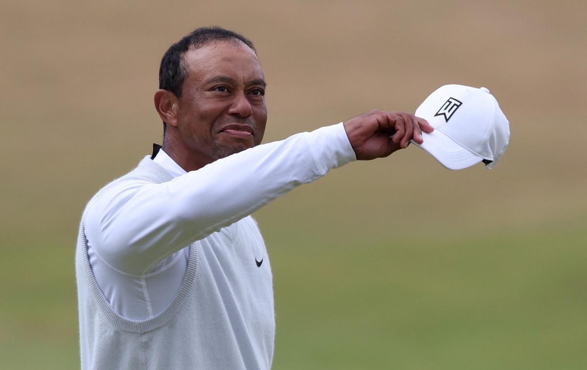Tiger Woods | Woods je bil zaradi lepega sprejema gledalcev vidno ganjen.  | Foto Reuters