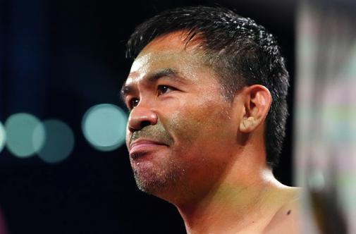 Boksarski povratnik Pacquiao po točkah izgubil proti Barriosu