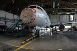 Adria Airways prodaja hangar, letališko ploščad in letalsko šolo