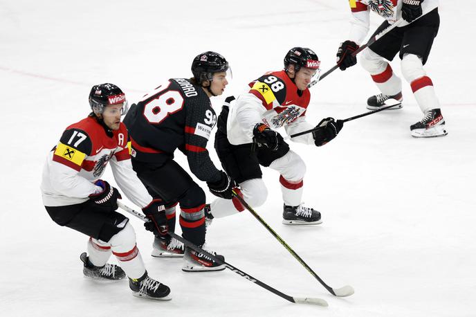 SP v hokeju 2024: Kanada - Avstrija | Kanadčani so šele po podaljšku premagali Avstrijce, pa čeprav so po dveh tretjinah vodili že s 6:1. | Foto Reuters