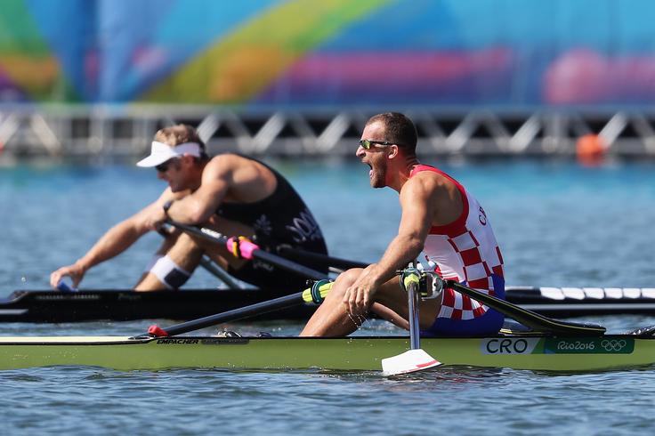 Mahe Drysdale in Damir Martin sta v cilj piršla z do stotinke enakim časom, a se je naslova olimpijskega prvaka veselil Novozelandec, Hrvat pa se je moral zadovoljiti z drugim mestom. | Foto: Getty Images