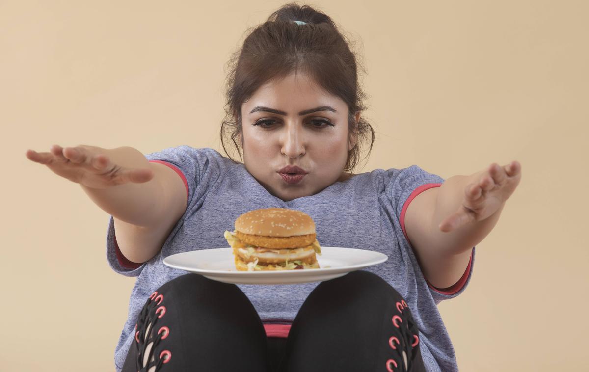 hamburger debelost | Debelost povzroča vsaj 13 različnih vrst raka in je verjetno odgovorna za vsaj 200 tisoč novih primerov raka. | Foto Guliverimage