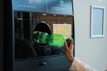 Avtomat za vračilo embalaže, kavcijski sistem