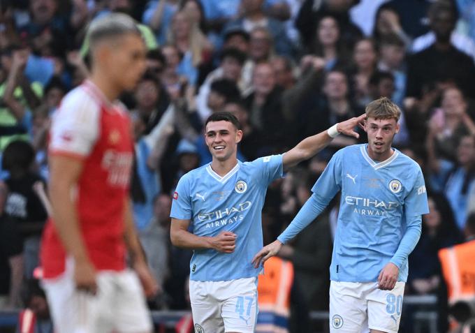 Rezervist Cole Palmer je popeljal Manchester City v vodstvo v 77. minuti. Akcijo je začel Phil Foden, nato pa je podajo prispeval Kevin de Bruyne. | Foto: Reuters