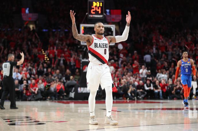 Damian Lillard | Damian Lillard je k zmagi Portlanda proti Oklahomi prispeval 29 točk, tudi trojko z velike razdalje. | Foto Reuters