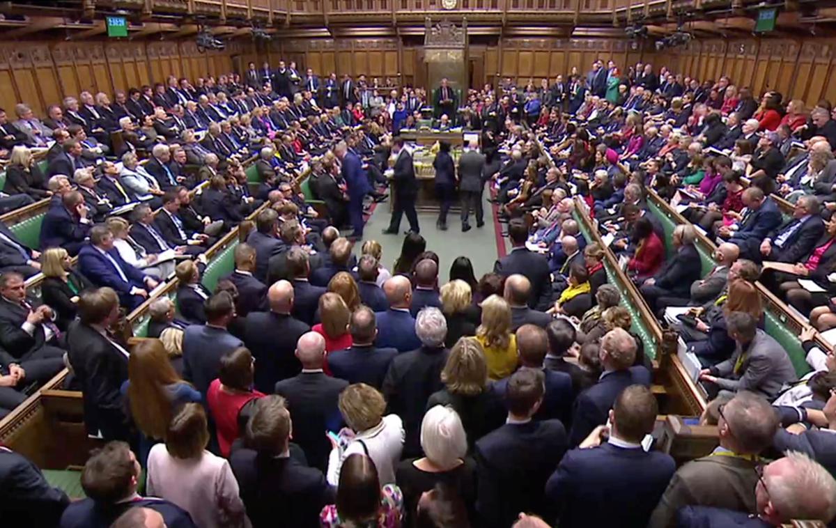 britanski poslanci London | Za dopolnilo je glasovalo 322, proti pa 306 poslancev. | Foto Reuters