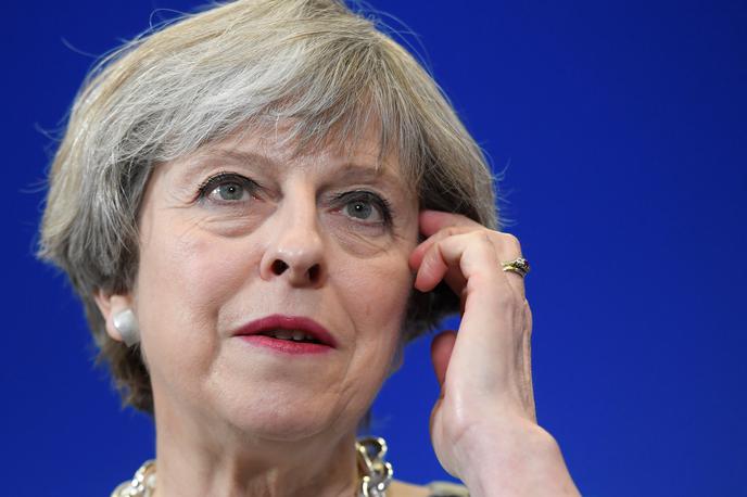 Theresa May | Predstavniki britanske vlade so sporočili, da glasovanja o dogovoru o brexitu tokrat ne nameravajo spet preložiti. Na fotografiji britanska premierka Theresa May. | Foto Reuters
