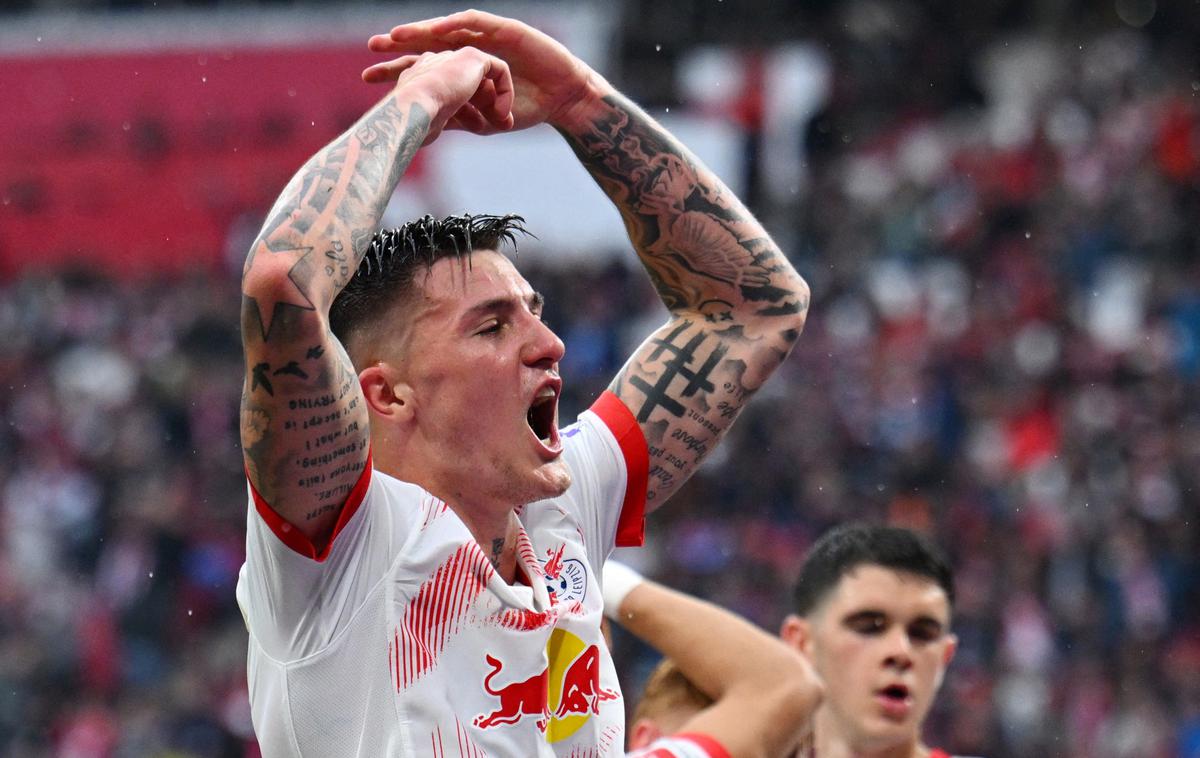 Benjamin Šeško | Benjamin Šeško bo poleti skoraj zagotovo zapustil Leipzig, poroča dobro obveščeni poznavalec nogometnega zakulisja Fabrizio Romano. | Foto Reuters