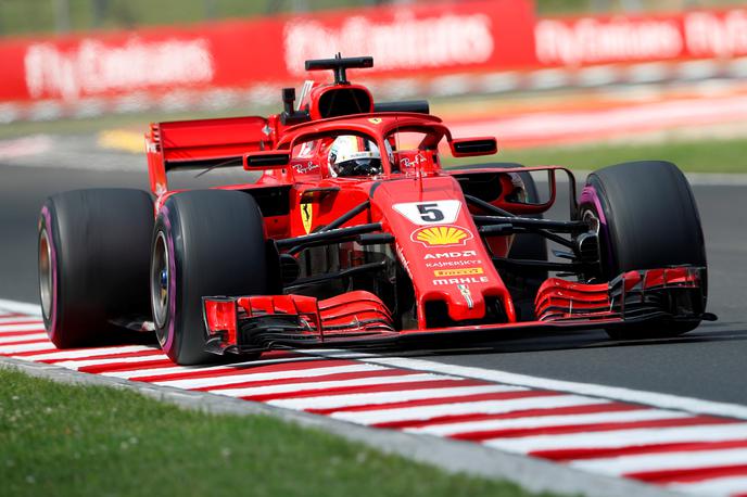 Sebastian Vettel | Nemec Sebastian Vettel bo tudi v prihodnji sezoni vozil za Ferrari. | Foto Reuters