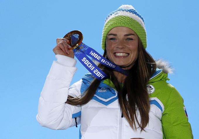 Tina Maze je leta 2014 na za Slovenijo najuspešnejših olimpijskih igrah postala prva Slovenka z zlato olimpijsko kolajno na zimskih OI. | Foto: Reuters