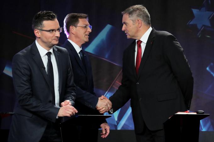 SD Dejana Židana (desno) in SMC Mira Cerarja (v sredini) sta združili moči v boju proti sporazumu, ki ga je premier Marjan Šarec (levo) sklenil z Levico. | Foto: STA ,