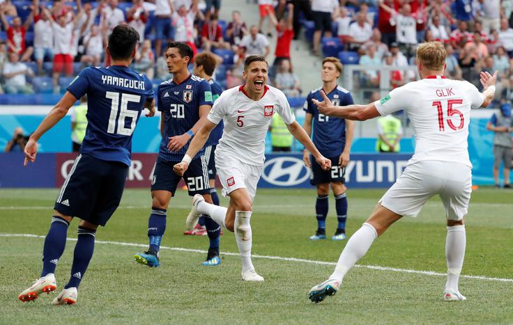 Poljska je v skupini H premagala le Japonsko in s tremi točkami zasedla zadnje mesto. | Foto: Reuters