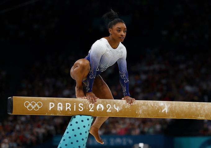 Simone Biles ostaja pri sedmih zlatih olimpijskih medaljah. | Foto: Reuters