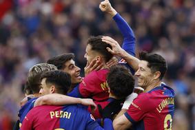Barcelona z igralcem več prerešetala mrežo in se vrnila na vrh
