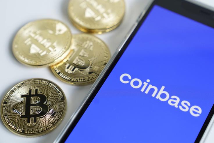 Coinbase je po volumnu trgovanja druga največja borza s kriptovalutami na svetu. Presega jo le še Binance. | Foto: AP / Guliverimage