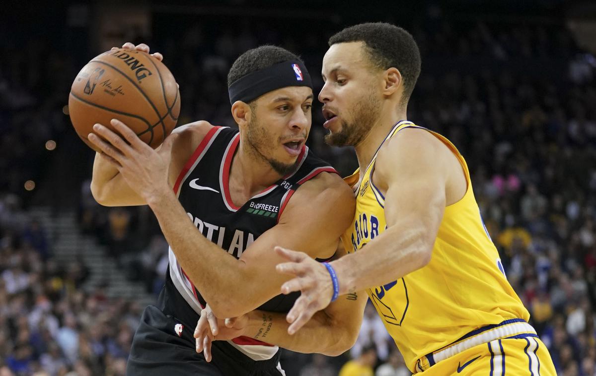 steven seth curry | Obračun Golden State Warriors in Portlanda je bil tudi obračun bratov Curry. Zmaga je pripadla mlajšemu Sethu Curryju. | Foto Reuters