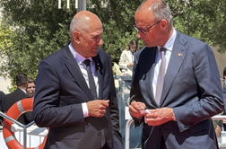 O čem je Janša govoril z nemškim kanclerjem?