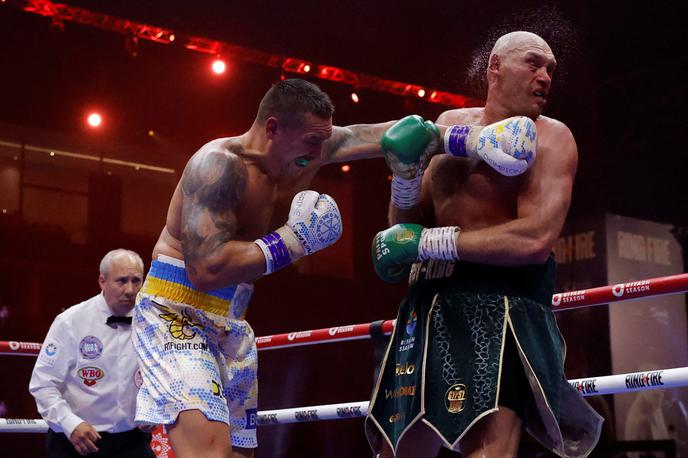Tyson Fury | V osmi rundi je Ukrajinec Britancu zlomil nos, Usik pa je proti koncu devete runde s serijo levih krošejev otresel Furyja. | Foto Reuters