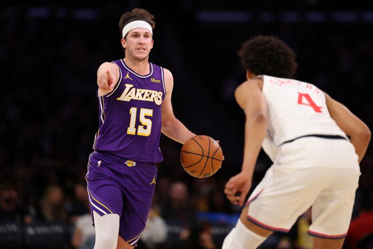 Austin Reaves je bil z 28 točkami in ob odličnem metu iz igre 10/13 prvi junak Lakersov. | Foto: Reuters