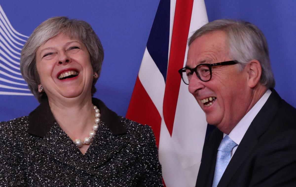 Theresa May in Jean Claude Juncker | Foto Reuters