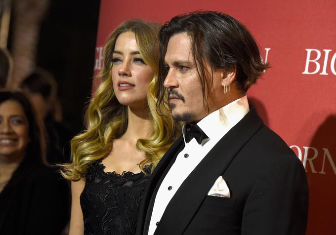 Johnny je ob ločitvi Amber izplačal sedem milijonov dolarjev (6,2 milijona evrov). | Foto: Getty Images