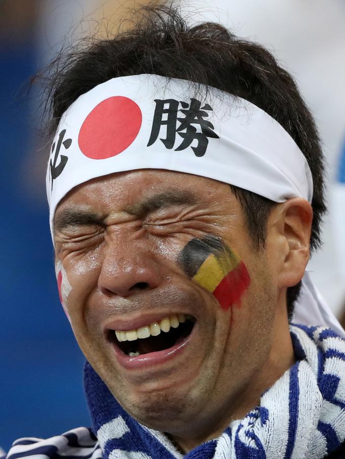 Japonski navijači so težko sprejeli dramatičen poraz v Rostovu. | Foto: Reuters