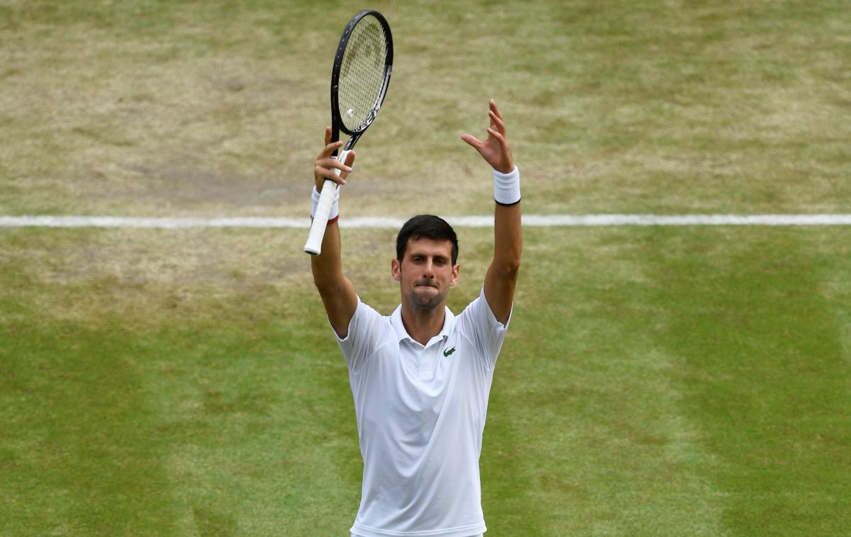 Novak Đoković | Novak Đoković si je polfinale zagotovil v manj kot dveh urah. Nasproti mu bo stal Španec Roberto Bautista Agut. | Foto Reuters
