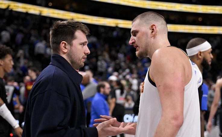 Luka Dončić in Nikola Jokić se bosta spopadla v noči na petek. | Foto: Reuters
