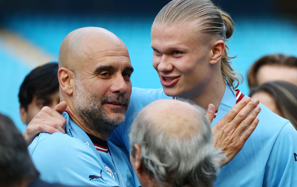 Erling Haaland | Erling Haaland in Josep Guardiola sta med tremi finalisti v izboru igralca/trenerja sezone 2022/23. | Foto Reuters