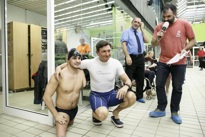 S predsednikom Borutom Pahorjem na dobrodelnem plavalnem dogodku leta 2013, kjer so zbirali sredstva za nakup novih, sodobnejših protez. | Foto: Guliverimage/Vladimir Fedorenko