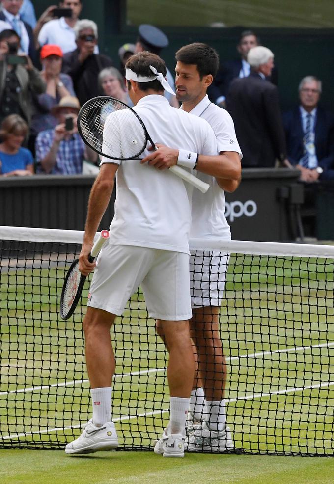 Novak Đoković je v nepozabnem finalu v Wimbledonu po velikem maratonu ugnal Rogerja Federerja. | Foto: Reuters