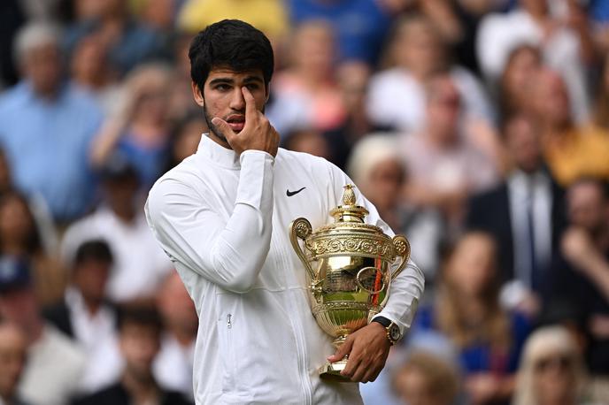 Carlos Alcaraz | Carlos Alcaraz je prvič zmagal turnir v Wimbledonu. | Foto Reuters