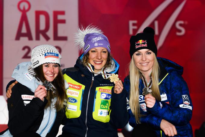 Ilki Štuhec sta v smuku na letošnjem SP na zmagovalnem odru družbo delali Švicarka Corinne Suter in Američanka Lindsey Vonn. | Foto: Reuters
